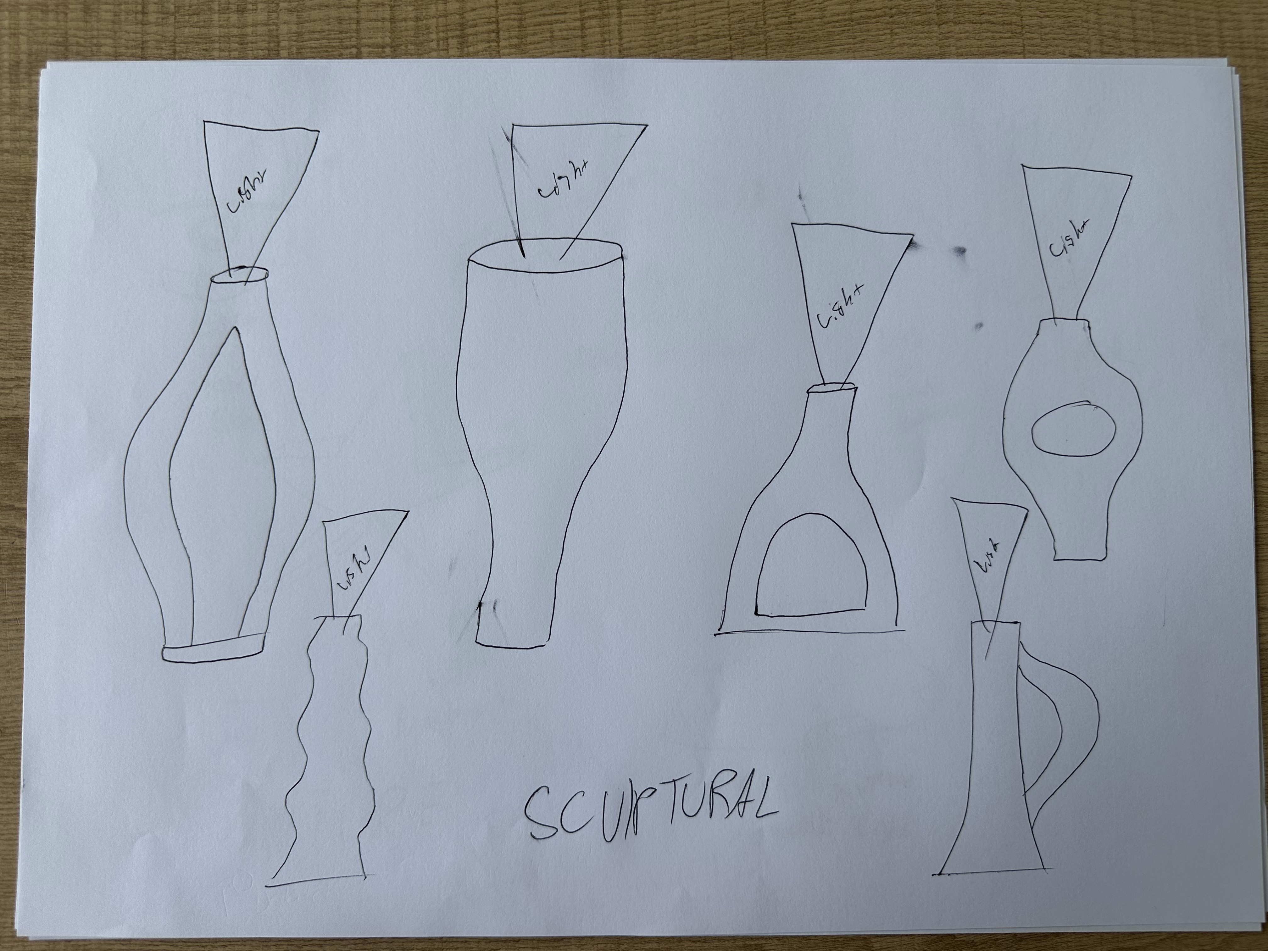 Sculptural torch ideation sketches exploring curved, vase-like and organic forms